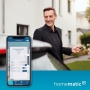 Homematic IP Smart Home remote control in the form of a key fob, alarm system