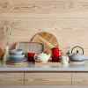 Le Creuset medium ceramic food storage jar with wooden lid