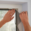 tesa insect stop STANDARD | Self-adhesive mosquito net for windows | Anthracite grey | 3x100 cm x 100 cm