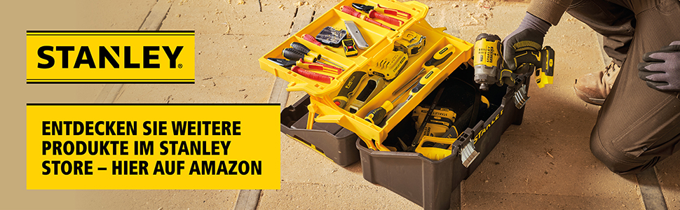 A man kneels in front of an open toolbox, with an impact wrench in his hand